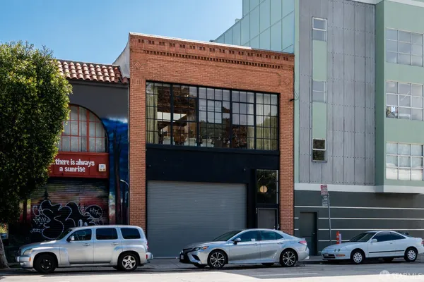 a car parked in front of a building