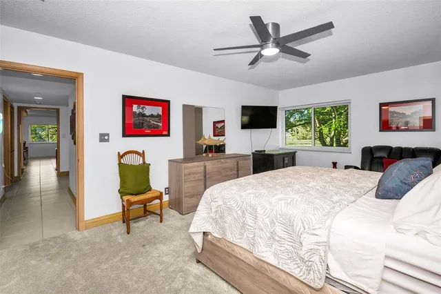 a bathroom with a sink and two mirror