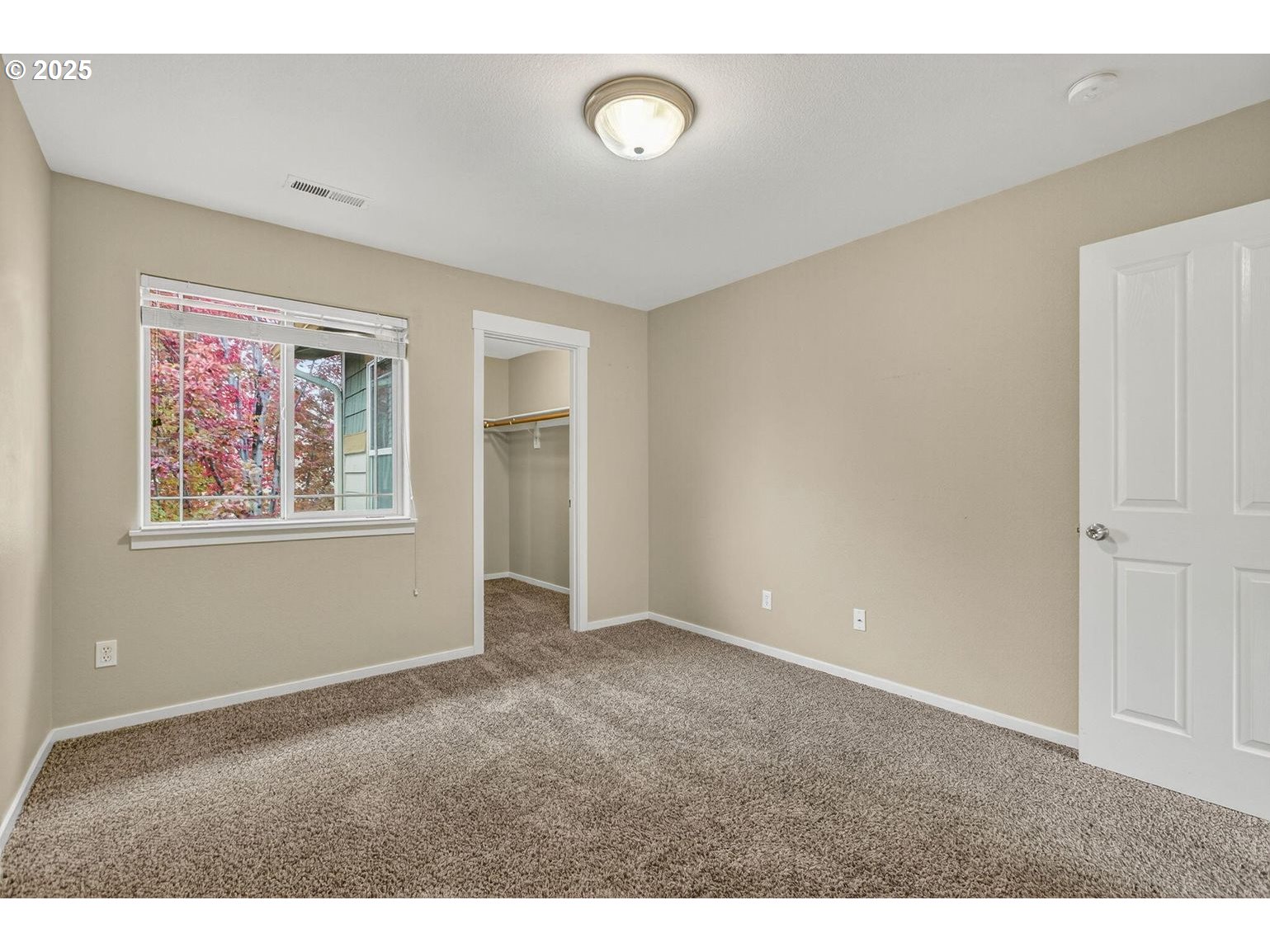 21154 Ritz Place Bend, OR 97702 - Photo 15 of 24 a view of an empty room with a window