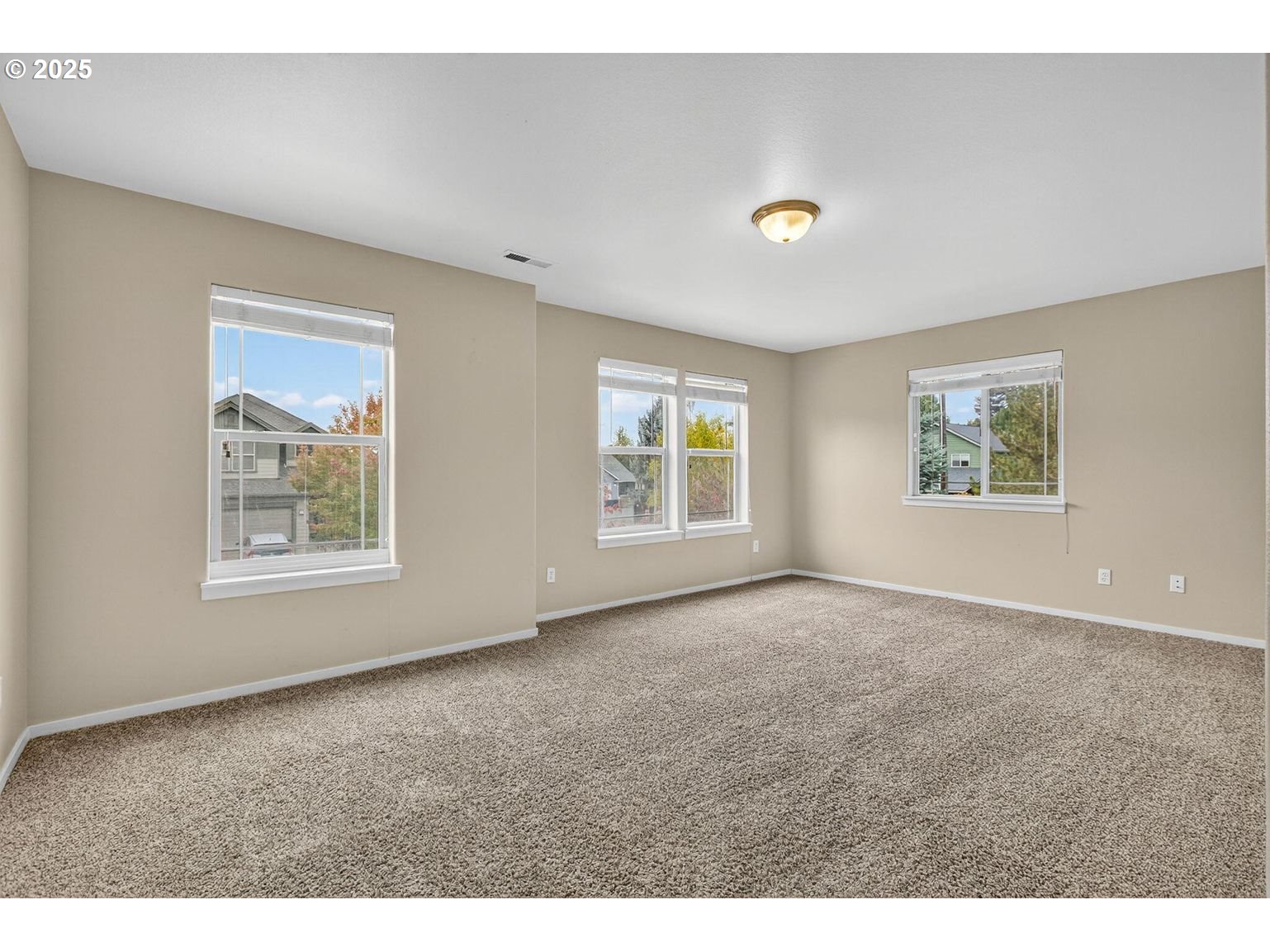 21154 Ritz Place Bend, OR 97702 - Photo 17 of 24 a view of an empty room with a window
