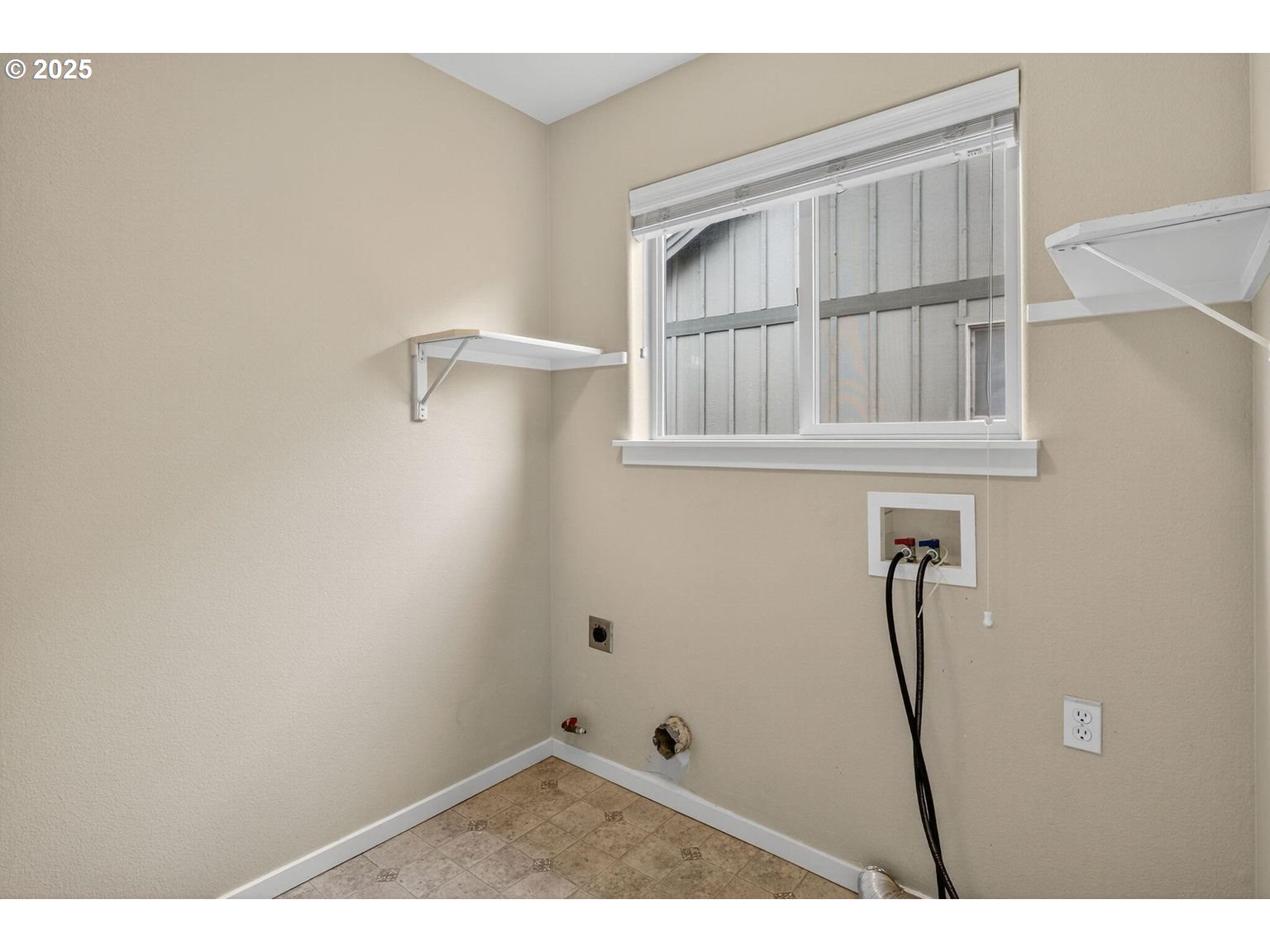 21154 Ritz Place Bend, OR 97702 - Photo 19 of 24 a view of small space with racks on the wall