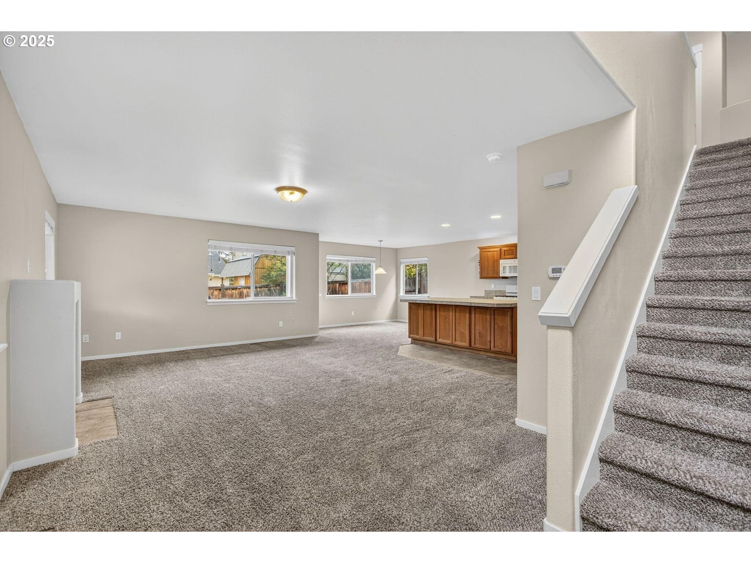 21154 Ritz Place Bend, OR 97702 - Photo 3 of 24 a view of entryway and hall with wooden floor