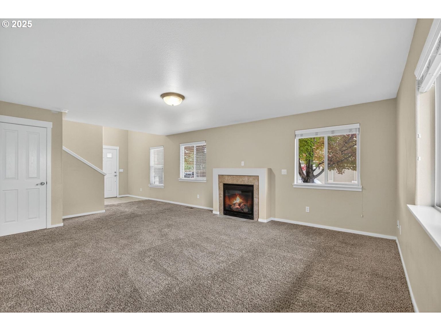21154 Ritz Place Bend, OR 97702 - Photo 4 of 24 a view of an empty room with a window