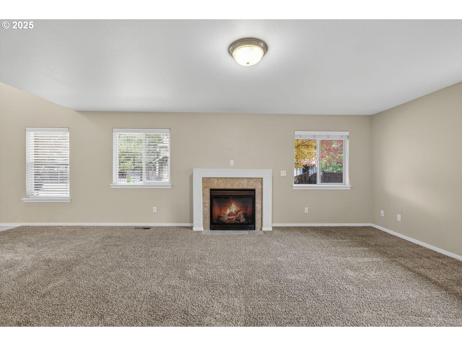 21154 Ritz Place Bend, OR 97702 - Photo 5 of 24 a view of an empty room with a window