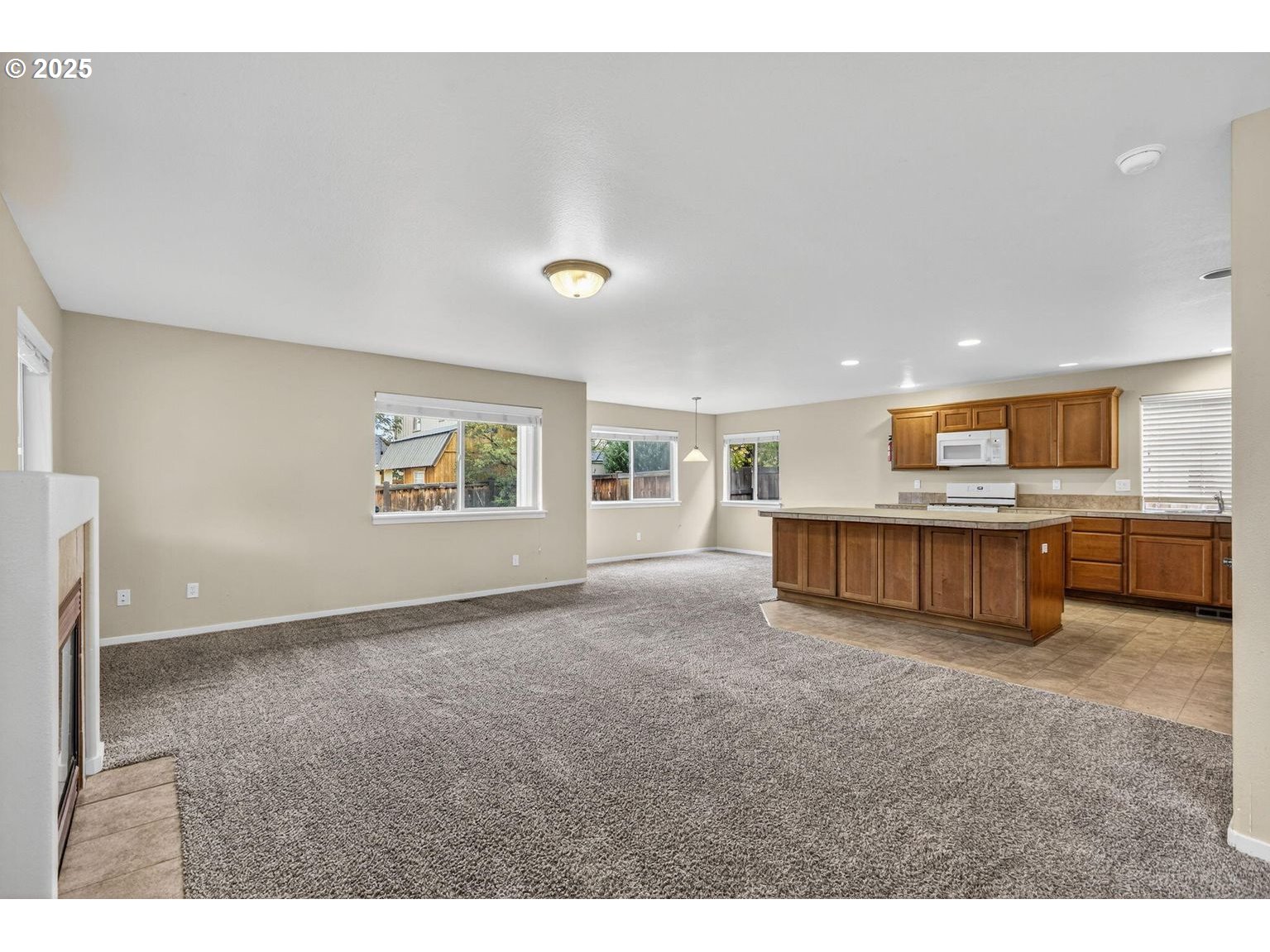 21154 Ritz Place Bend, OR 97702 - Photo 6 of 24 a view of an empty room with a window