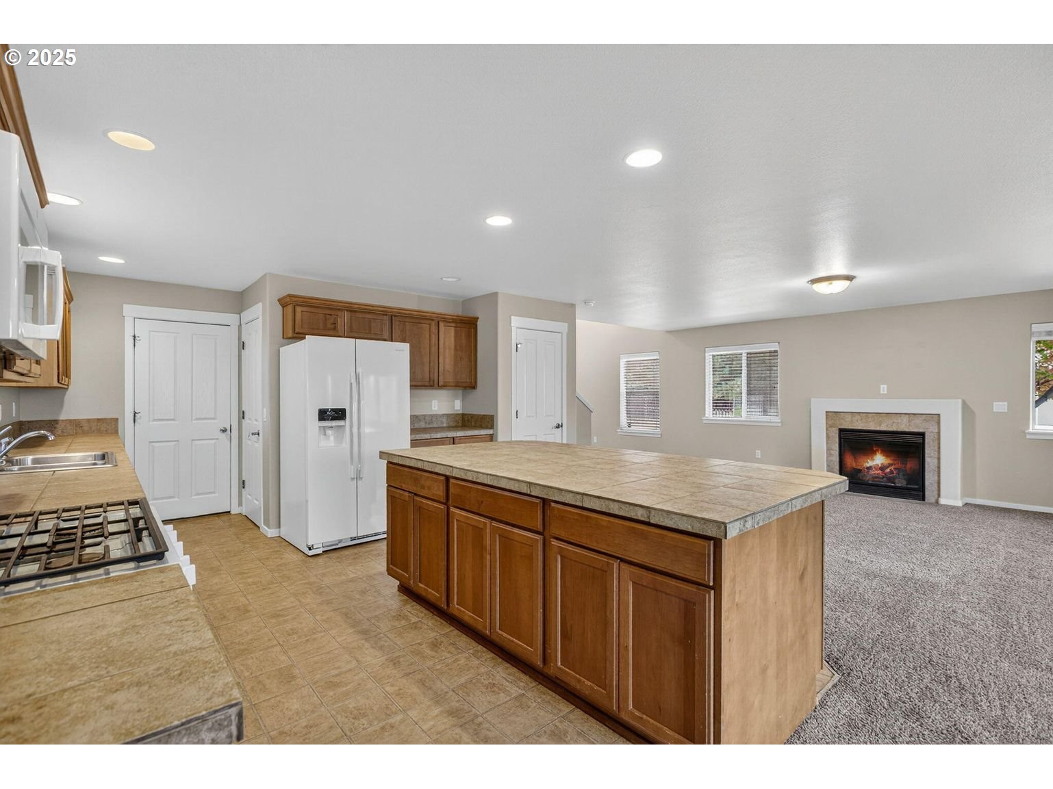 21154 Ritz Place Bend, OR 97702 - Photo 8 of 24 a spacious bathroom with a granite countertop sink and a mirror
