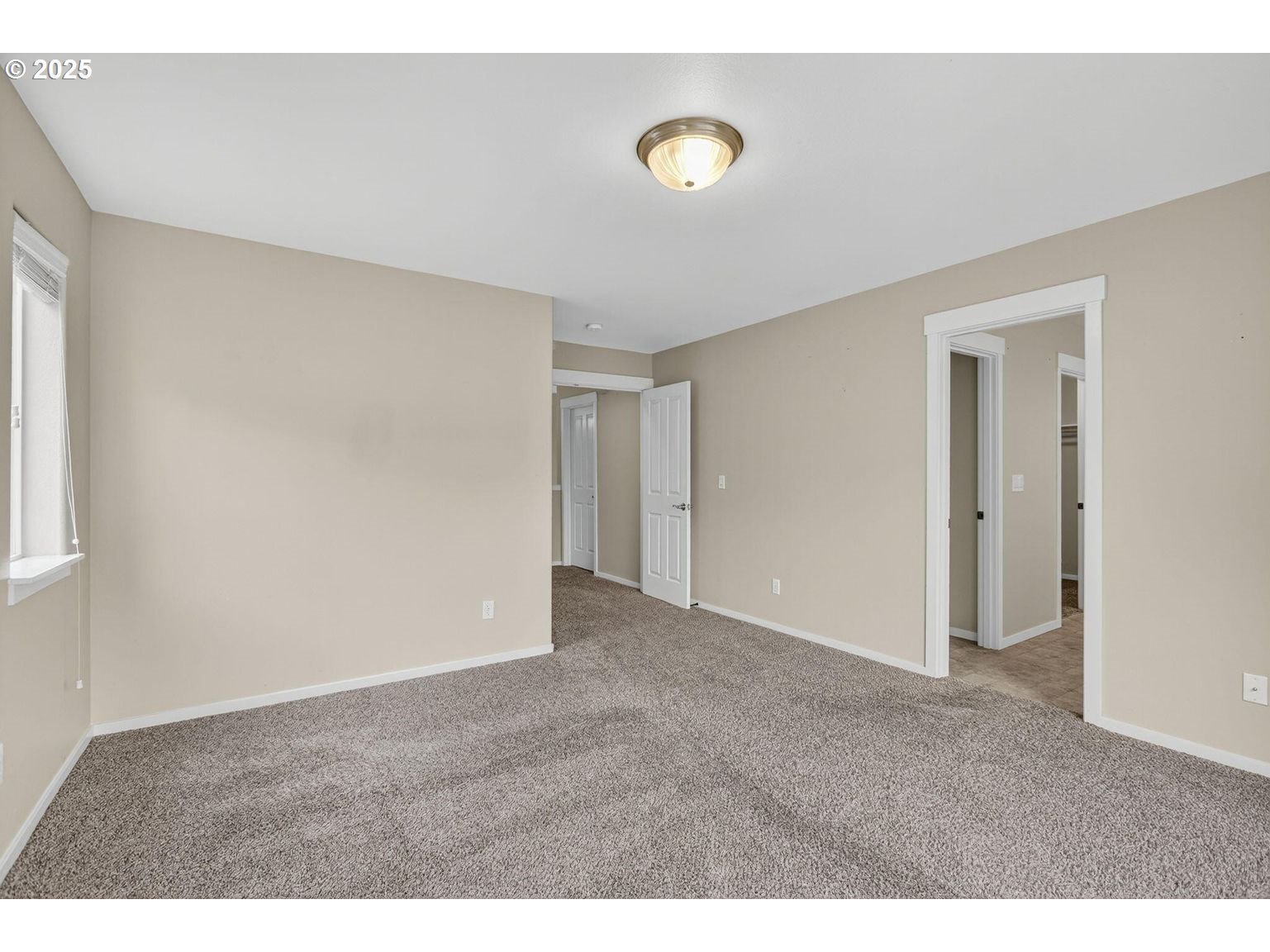 21154 Ritz Place Bend, OR 97702 - Photo 10 of 24 a view of an empty room with a window