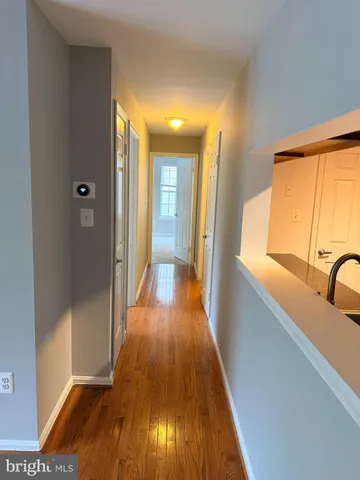 a view of a bathroom from the hallway