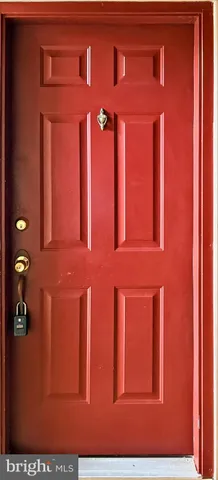 a view of a brick building with many windows