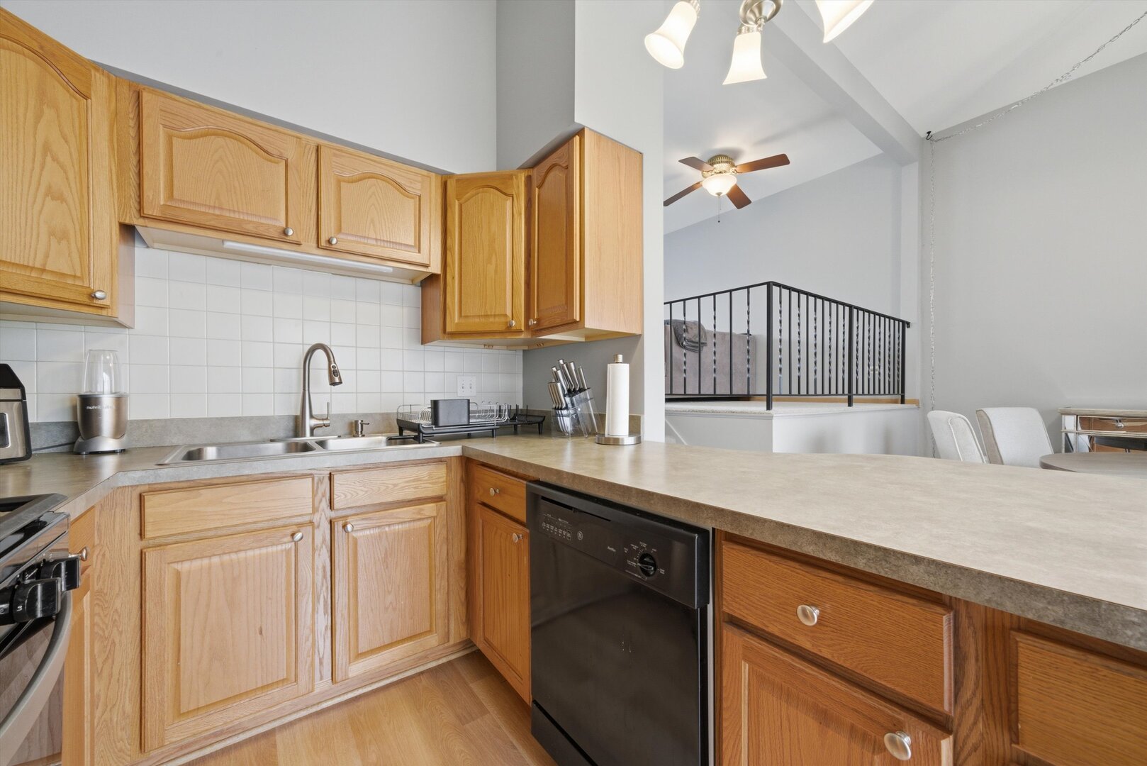 8820 Plainfield Road Brookfield, IL 60513 - Photo 18 of 49 a kitchen with a sink dishwasher and cabinets