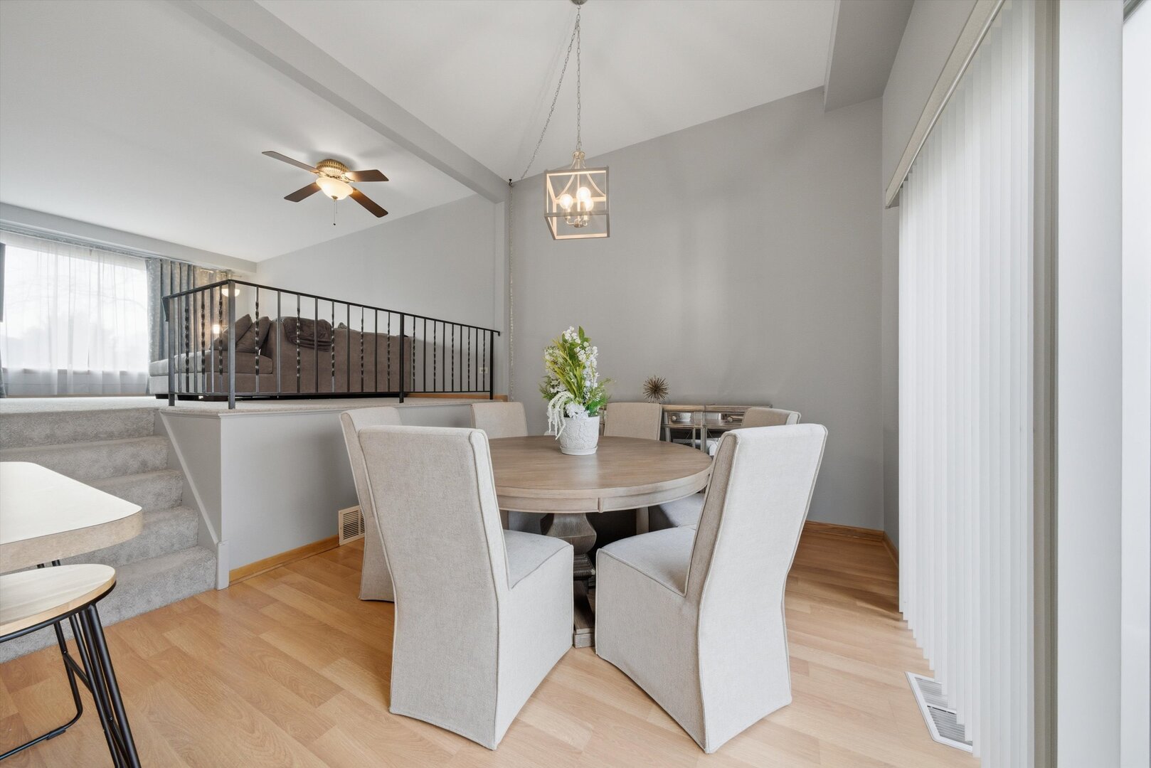 8820 Plainfield Road Brookfield, IL 60513 - Photo 20 of 49 a dining room with furniture a chandelier and wooden floor
