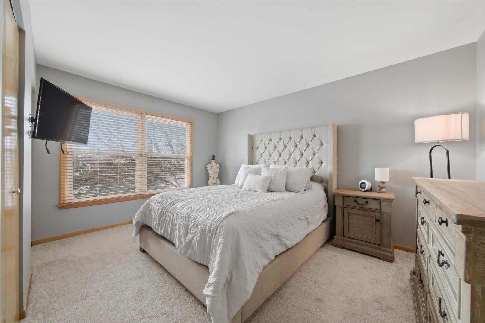 8820 Plainfield Road Brookfield, IL 60513 - Photo 22 of 49 a spacious bedroom with a bed and a large window