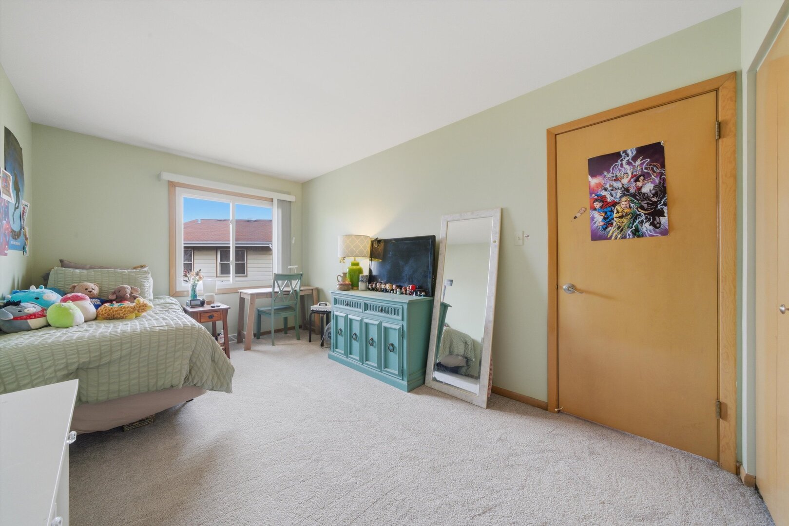 8820 Plainfield Road Brookfield, IL 60513 - Photo 25 of 49 a bedroom with furniture and a flat screen tv