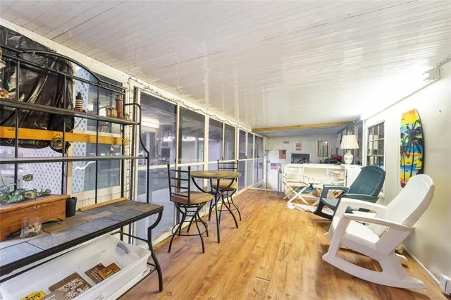 a view of a livingroom with furniture and wooden floor