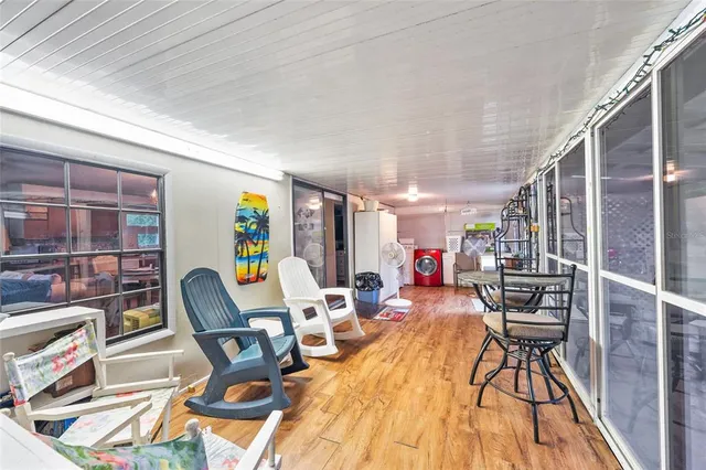 a kitchen with stainless steel appliances granite countertop a refrigerator and a stove