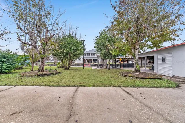 a view of a backyard with a garden