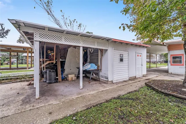 a view of a porch with furniture