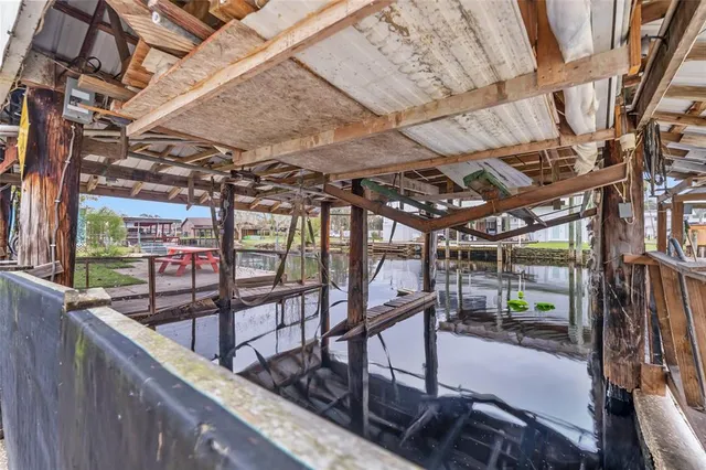 a view of a chairs and table in the patio