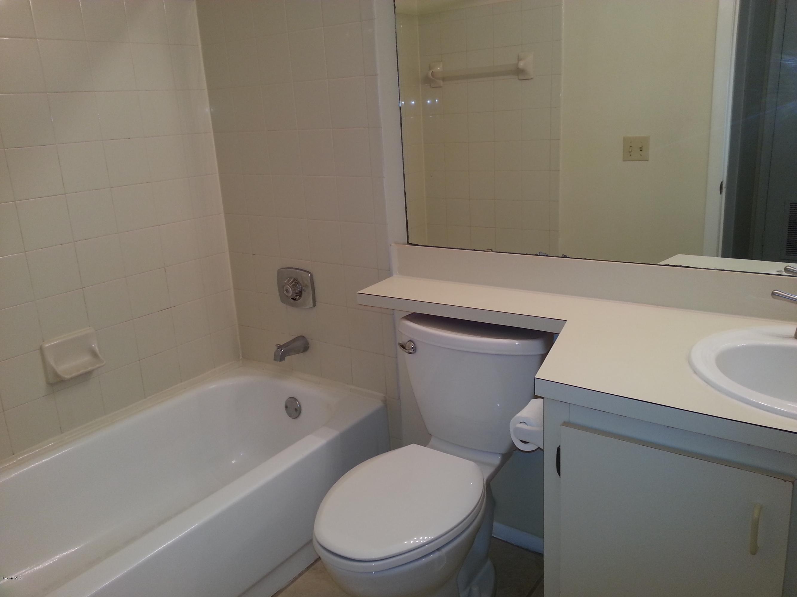 225 South Tropical Trail, Unit 913 Merritt Island, FL 32952 - Photo 9 of 14 Bathroom