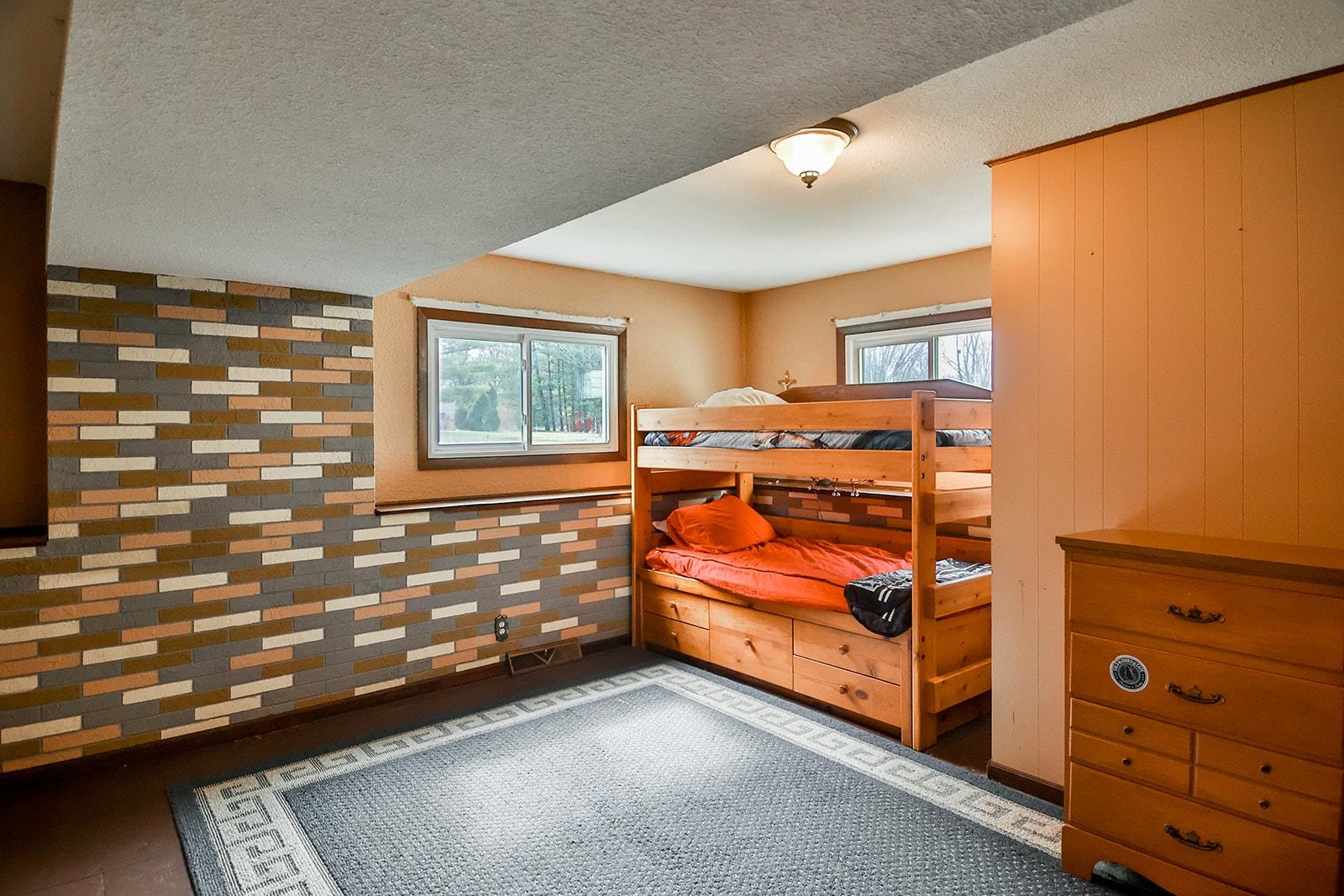 6855 Happy Acres Road Rockford, IL 61101 - Photo 12 of 39 a view of a bedroom with window cabinet and window