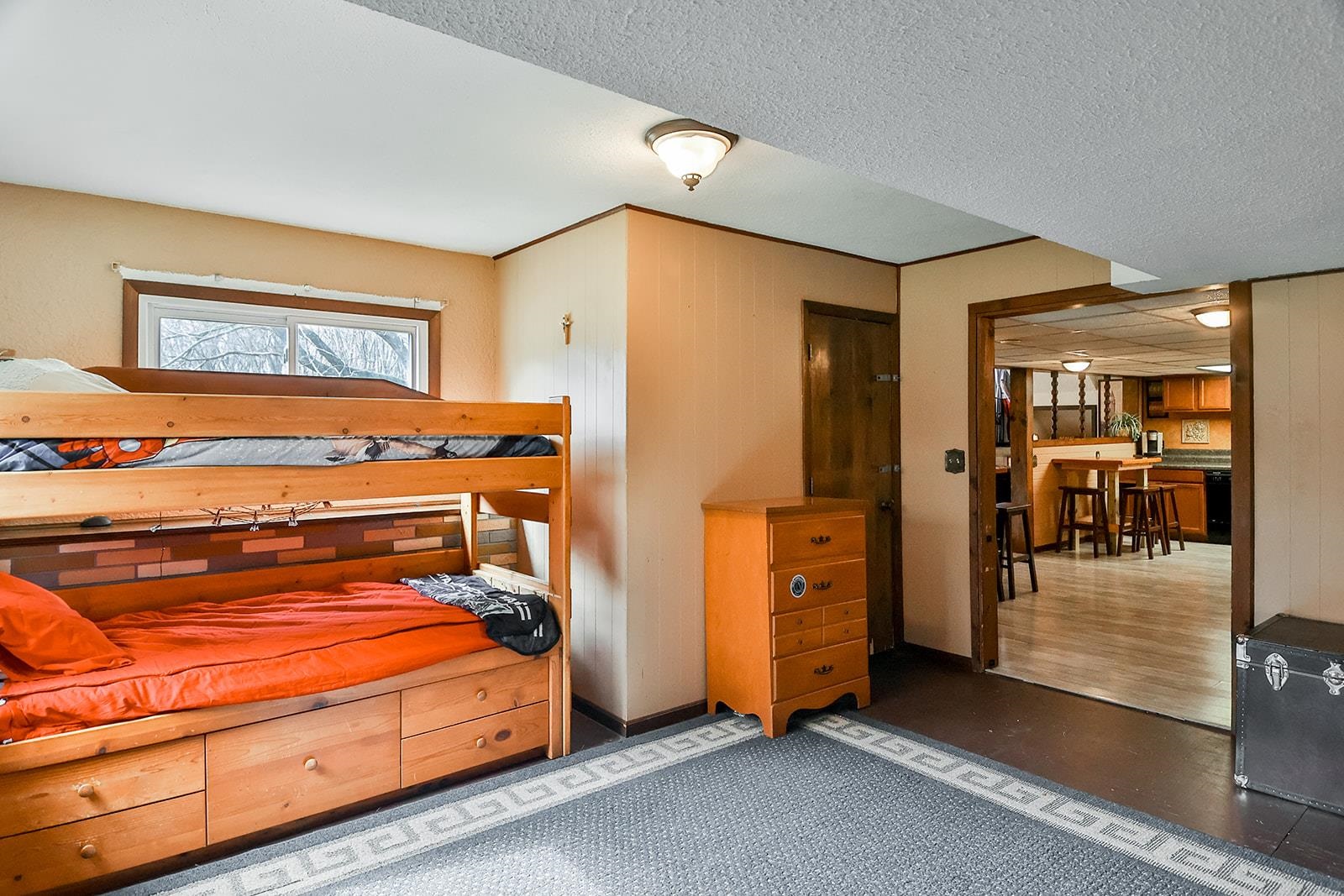 6855 Happy Acres Road Rockford, IL 61101 - Photo 13 of 39 a bedroom with a bed and cabinets