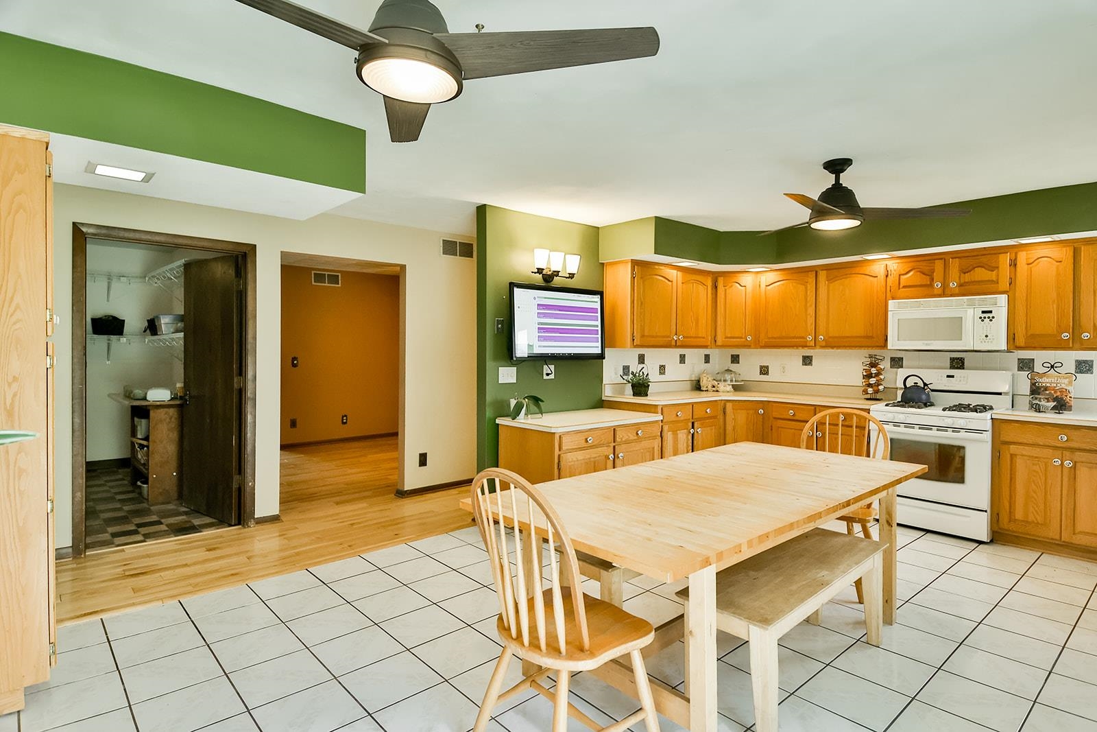 6855 Happy Acres Road Rockford, IL 61101 - Photo 26 of 39 a kitchen with stainless steel appliances kitchen island granite countertop a stove a sink and a refrigerator