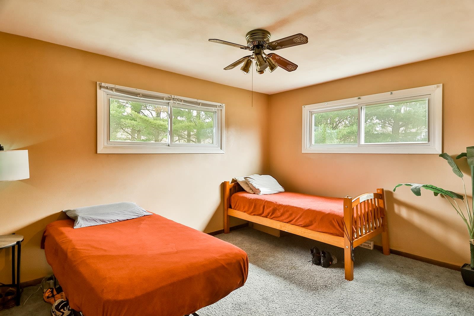 6855 Happy Acres Road Rockford, IL 61101 - Photo 33 of 39 a bedroom with 2 bed and a chandelier