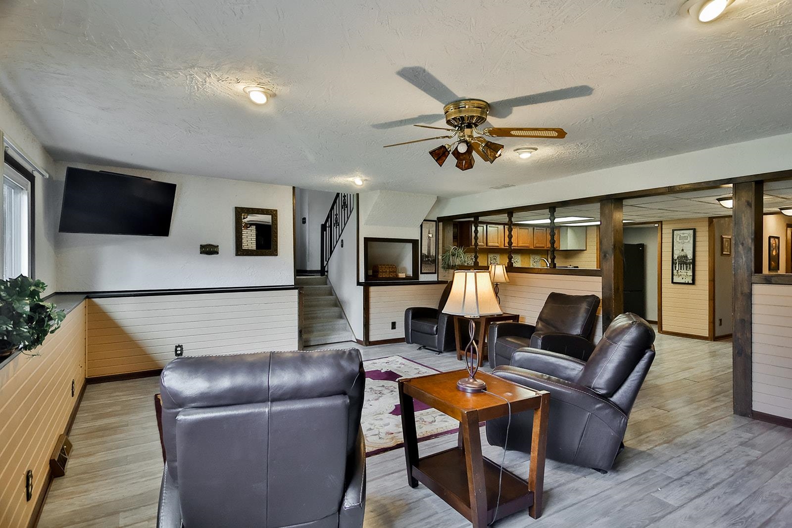 6855 Happy Acres Road Rockford, IL 61101 - Photo 7 of 39 a living room with furniture and a flat screen tv
