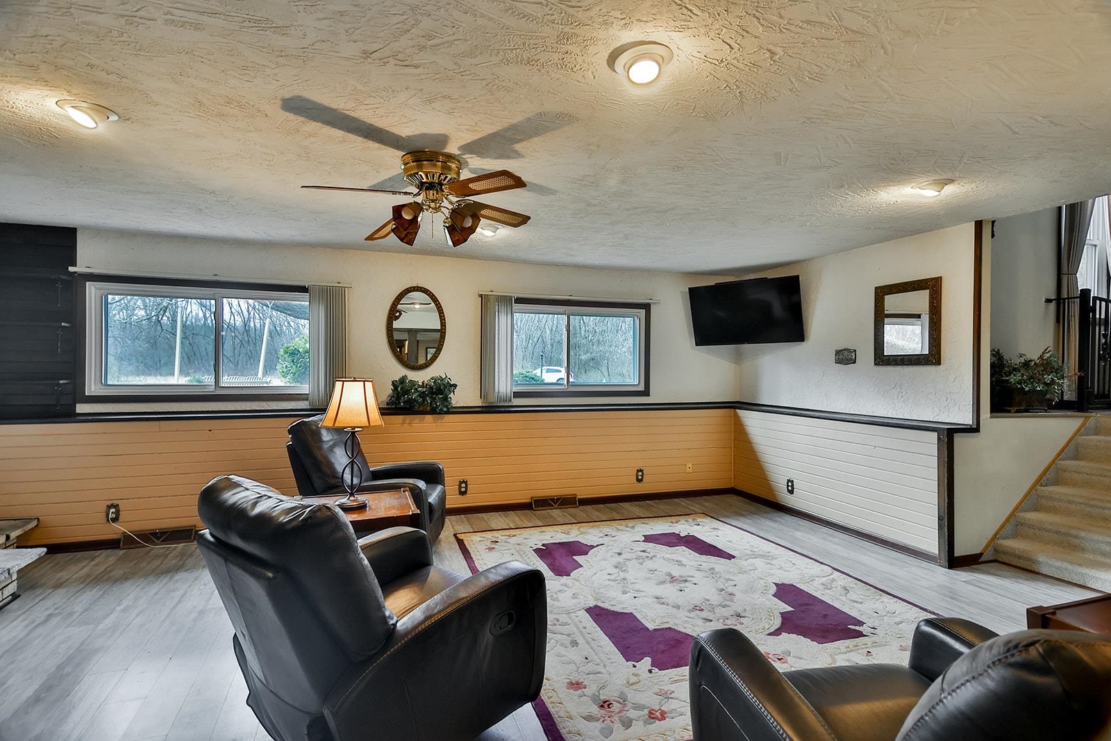 6855 Happy Acres Road Rockford, IL 61101 - Photo 8 of 39 a living room with furniture and a flat screen tv