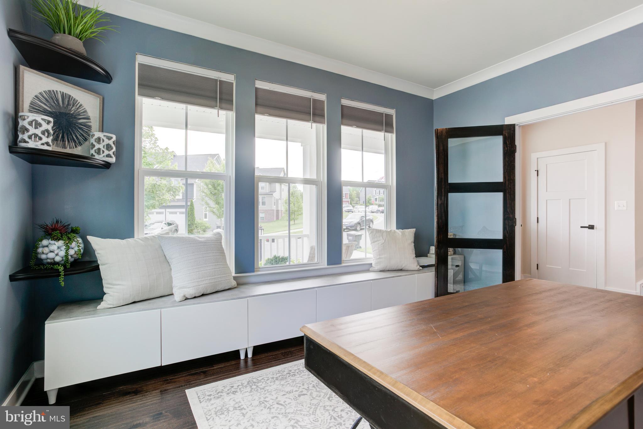2346 Sweet Pepperbrush Loop Dumfries, VA 22026 - Photo 11 of 84 a living room with furniture and a window