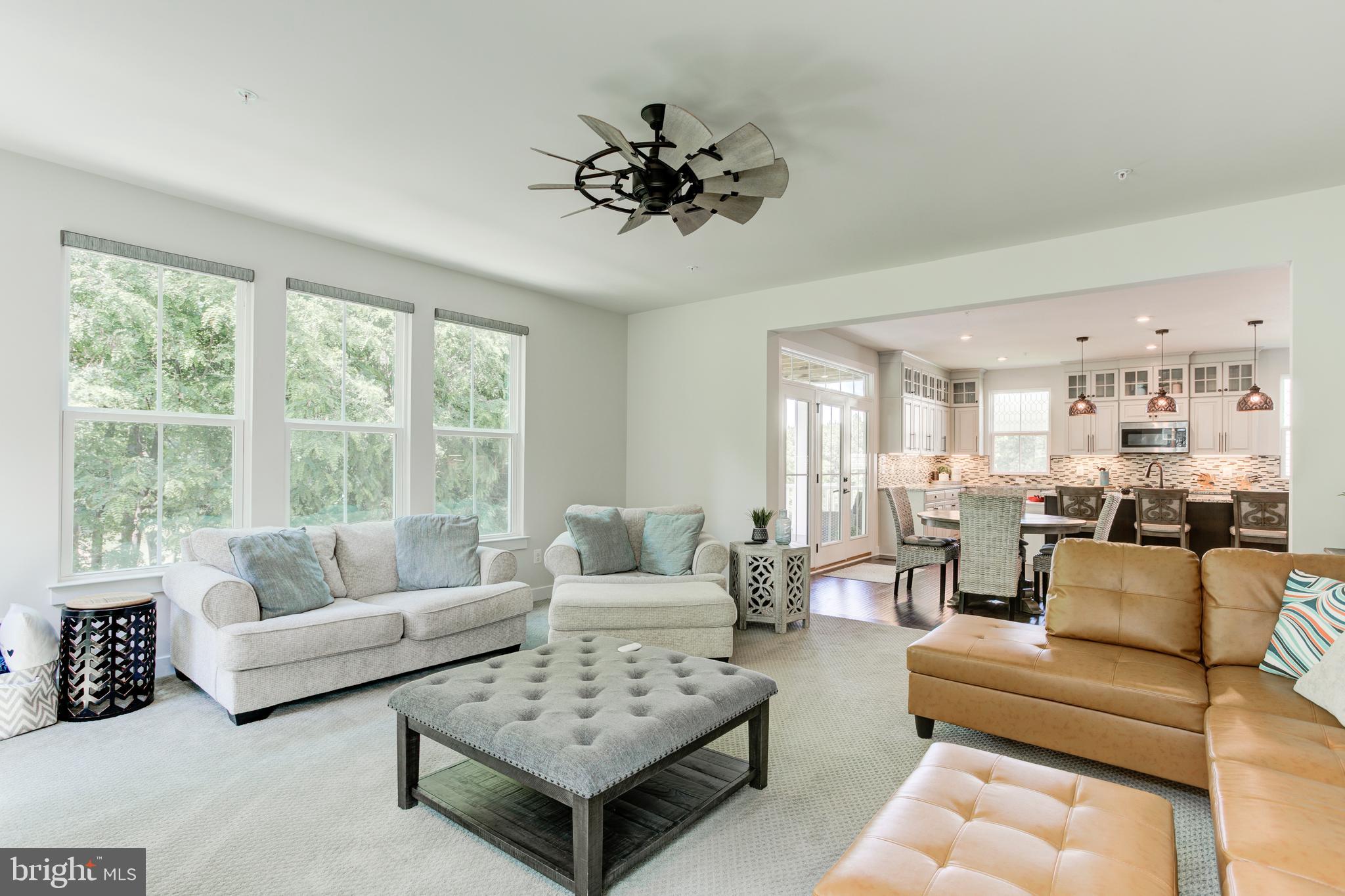 2346 Sweet Pepperbrush Loop Dumfries, VA 22026 - Photo 33 of 84 a living room with furniture and a large window
