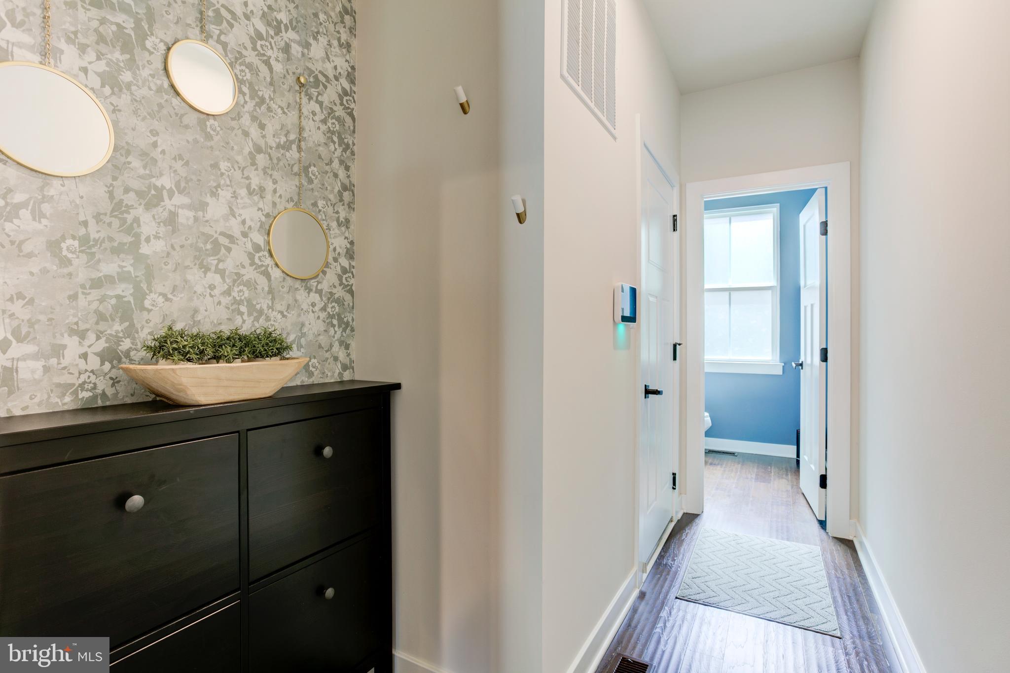 2346 Sweet Pepperbrush Loop Dumfries, VA 22026 - Photo 34 of 84 a bathroom with a sink and a mirror