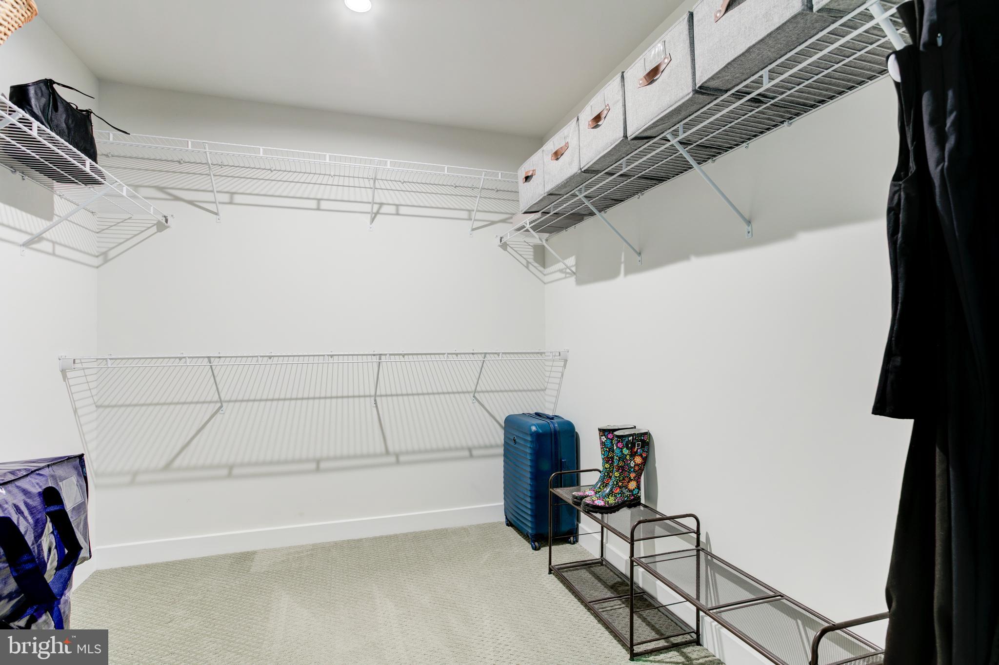 2346 Sweet Pepperbrush Loop Dumfries, VA 22026 - Photo 47 of 84 a view of a room with racks on the wall