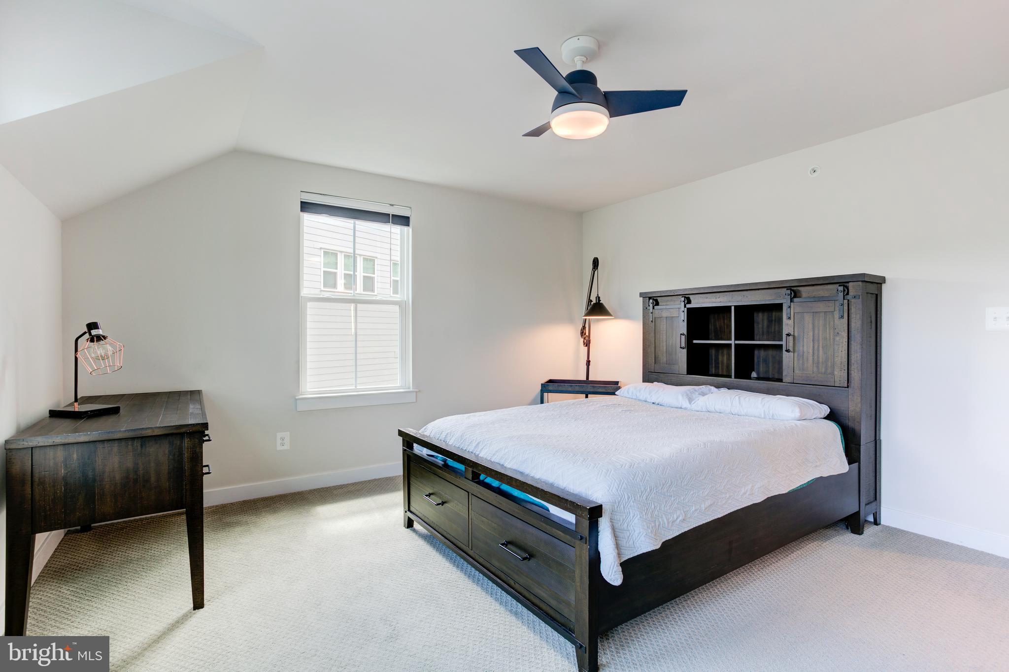 2346 Sweet Pepperbrush Loop Dumfries, VA 22026 - Photo 53 of 84 a bed room with a bed and a window