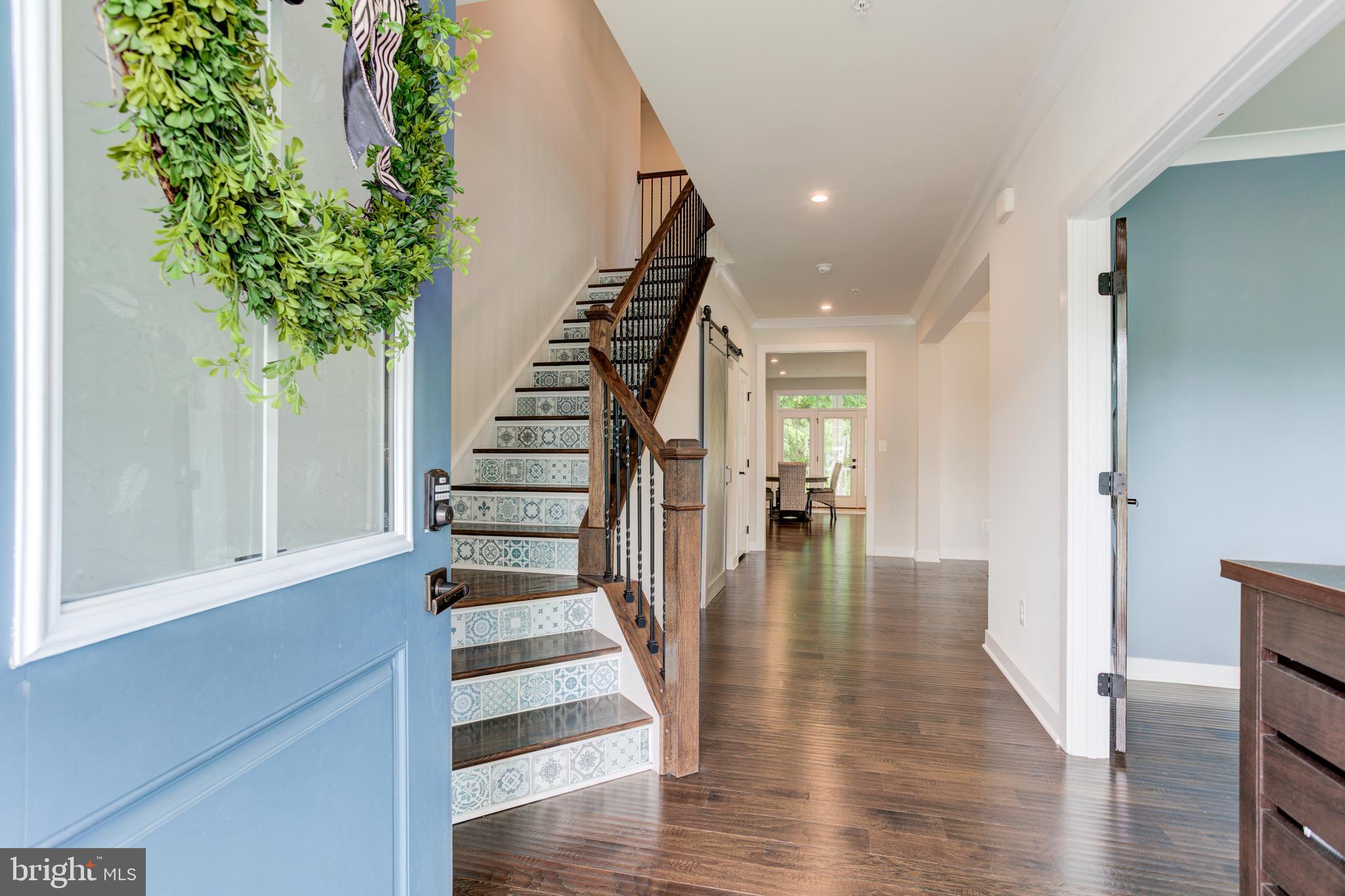 2346 Sweet Pepperbrush Loop Dumfries, VA 22026 - Photo 7 of 84 a view of entryway with wooden floor