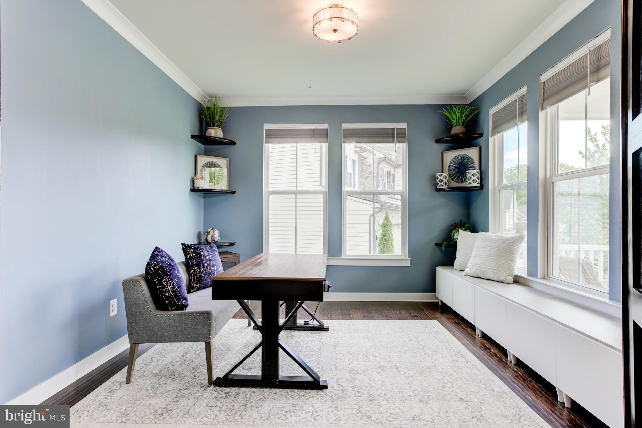 2346 Sweet Pepperbrush Loop Dumfries, VA 22026 - Photo 9 of 84 a living room with furniture and a window