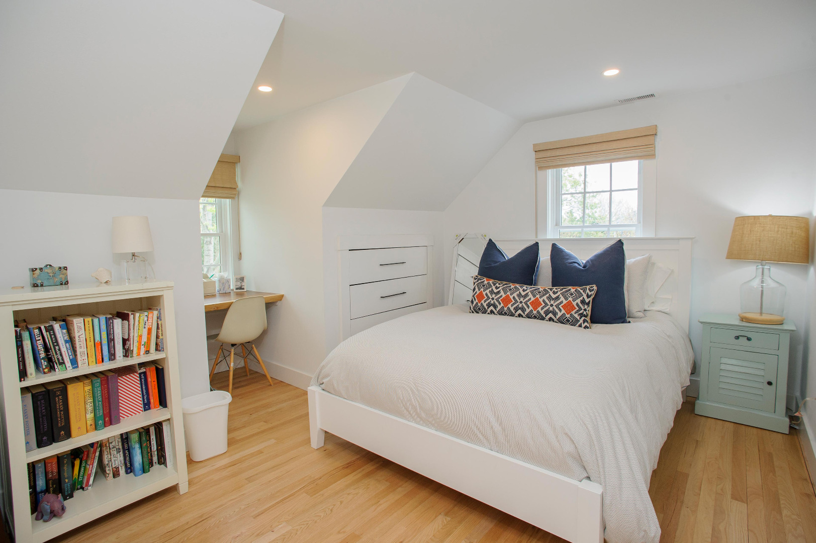 31 North Street Edgartown, MA 02539 - Photo 34 of 49 a bedroom with a bed and a book shelf