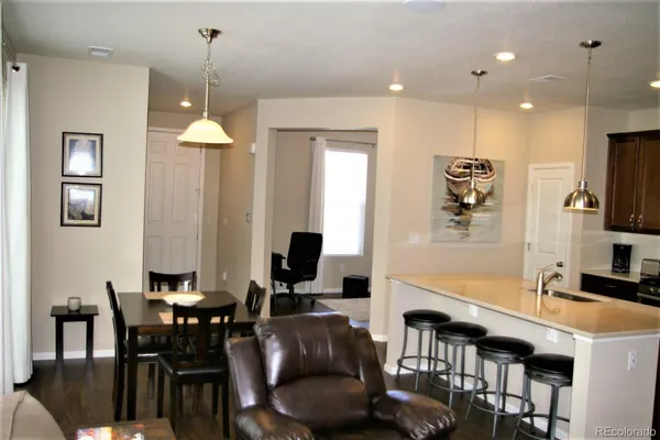 a view of a dining room with furniture