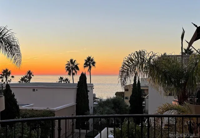 a view of a balcony with a trees