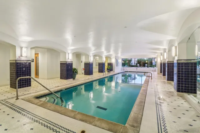 a view of a living room and kitchen