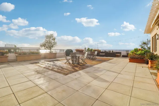 a view of a terrace with furniture