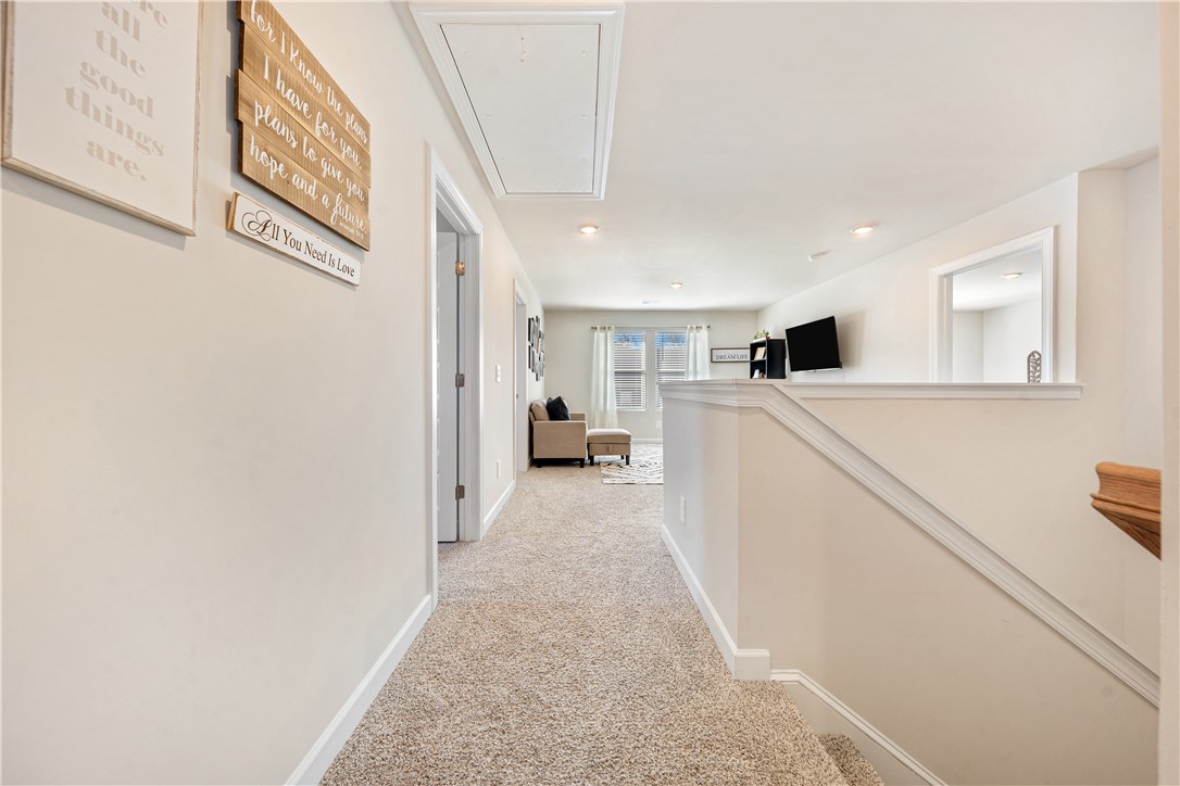 203 Maxwell Drive Easley, SC 29642 - Photo 19 of 34 This inviting hallway offers a warm transition to comfortable living spaces.