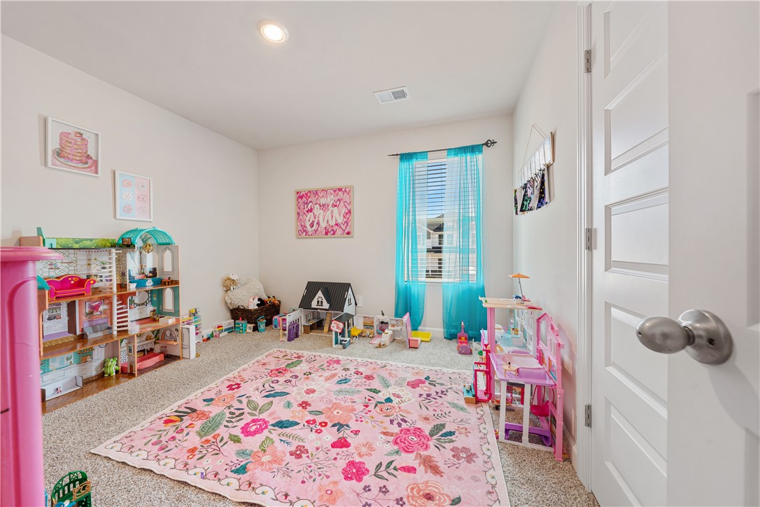 203 Maxwell Drive Easley, SC 29642 - Photo 28 of 34 This bright room features abundant natural light, creating an inviting and comfortable atmosphere.