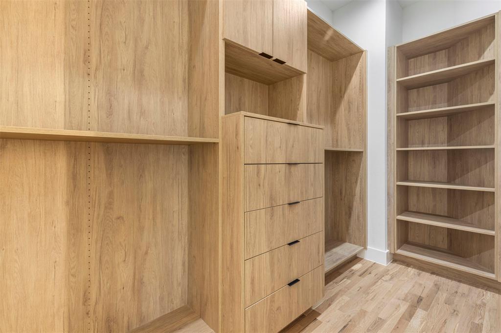5611 Ellsworth Avenue, Unit 102 Dallas, TX 75206 - Photo 13 of 25 Primary closet with custom built ins