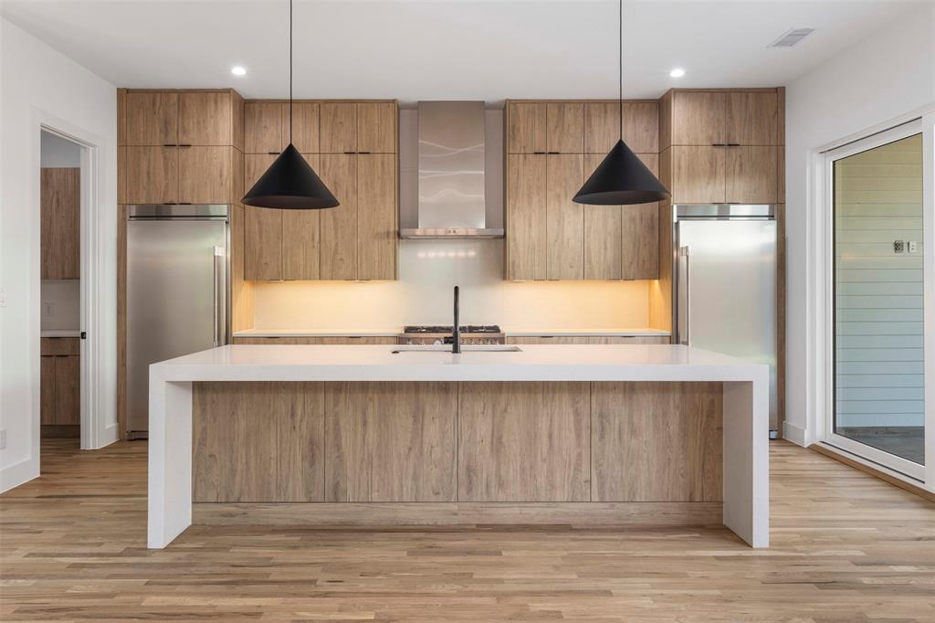 5611 Ellsworth Avenue, Unit 102 Dallas, TX 75206 - Photo 2 of 25 White oak cabinets