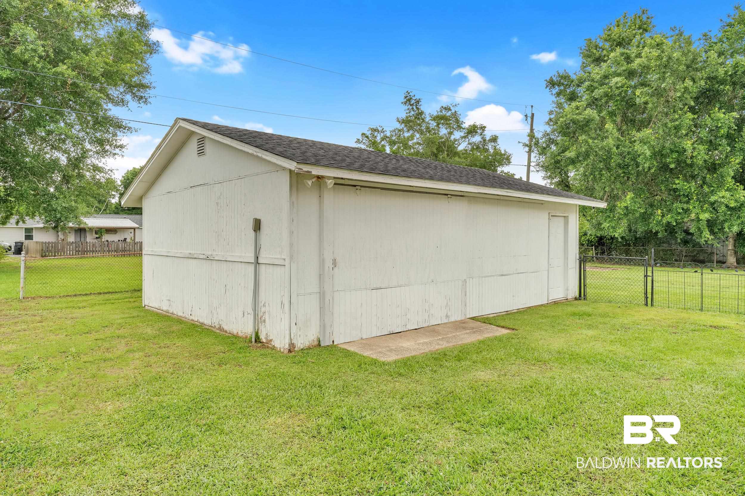 206 West Jackson Avenue Summerdale, AL 36580 - Photo 31 of 37 View of outbuilding with an outdoor structure