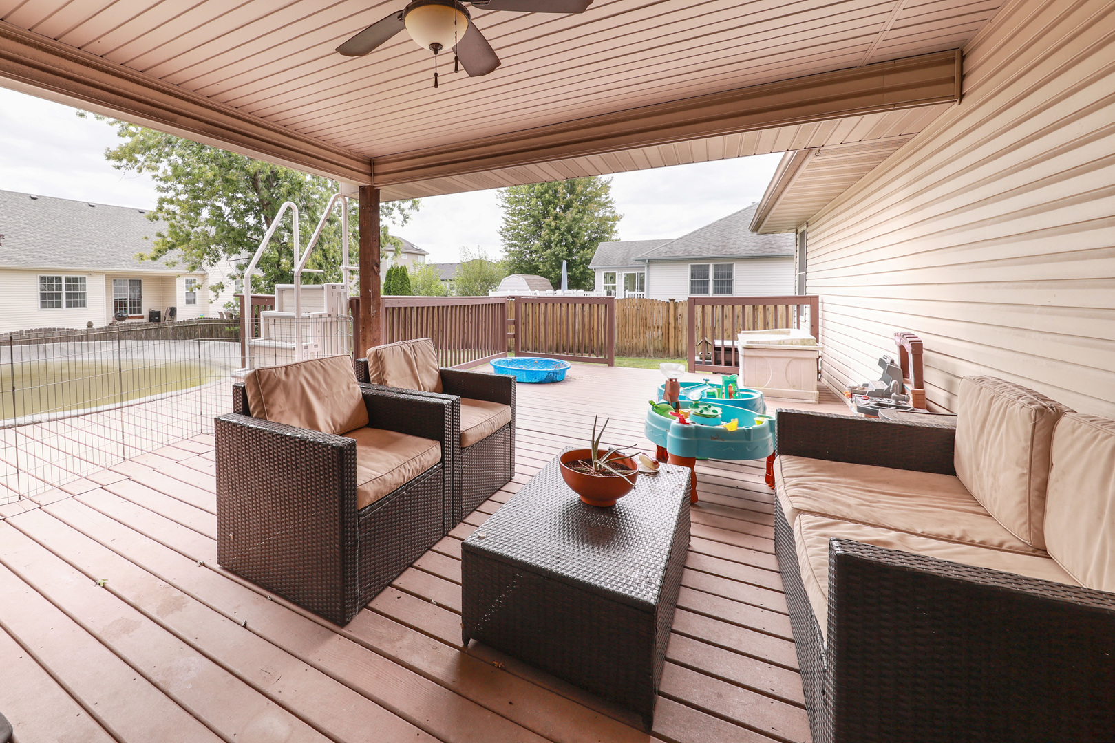 1115 Crystal Lane Diamond, IL 60416 - Photo 14 of 17 a outdoor space with patio the couches and a dining table with chairs