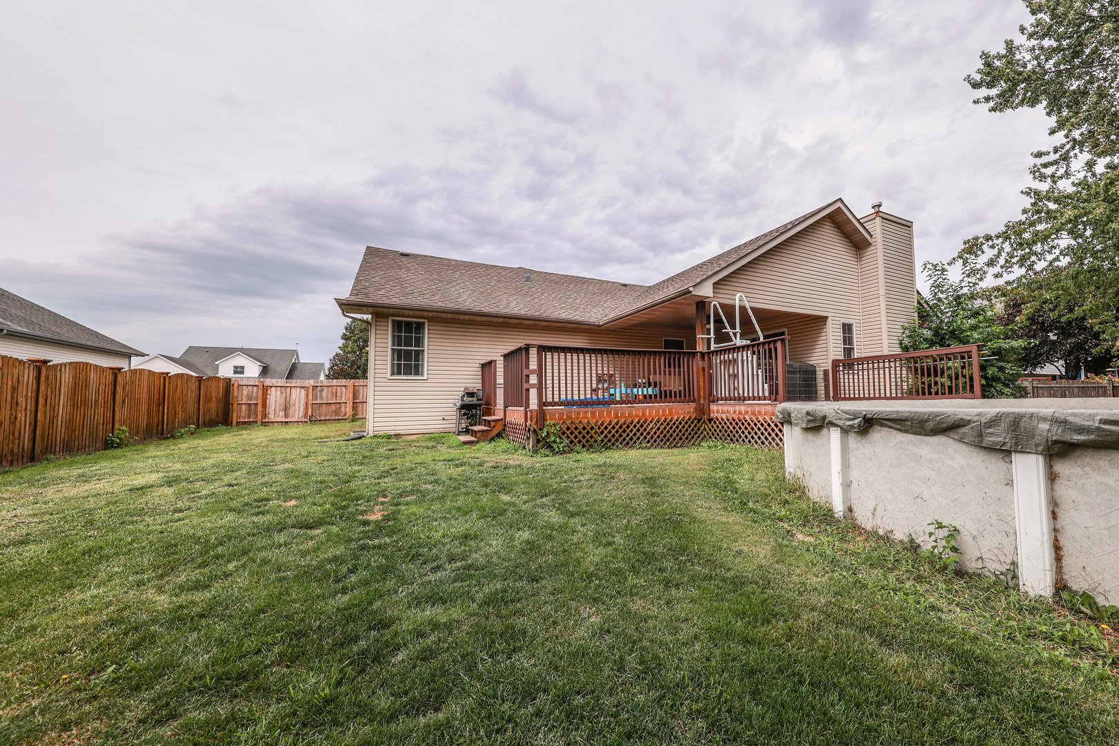 1115 Crystal Lane Diamond, IL 60416 - Photo 16 of 17 a view of a house with pool and a yard
