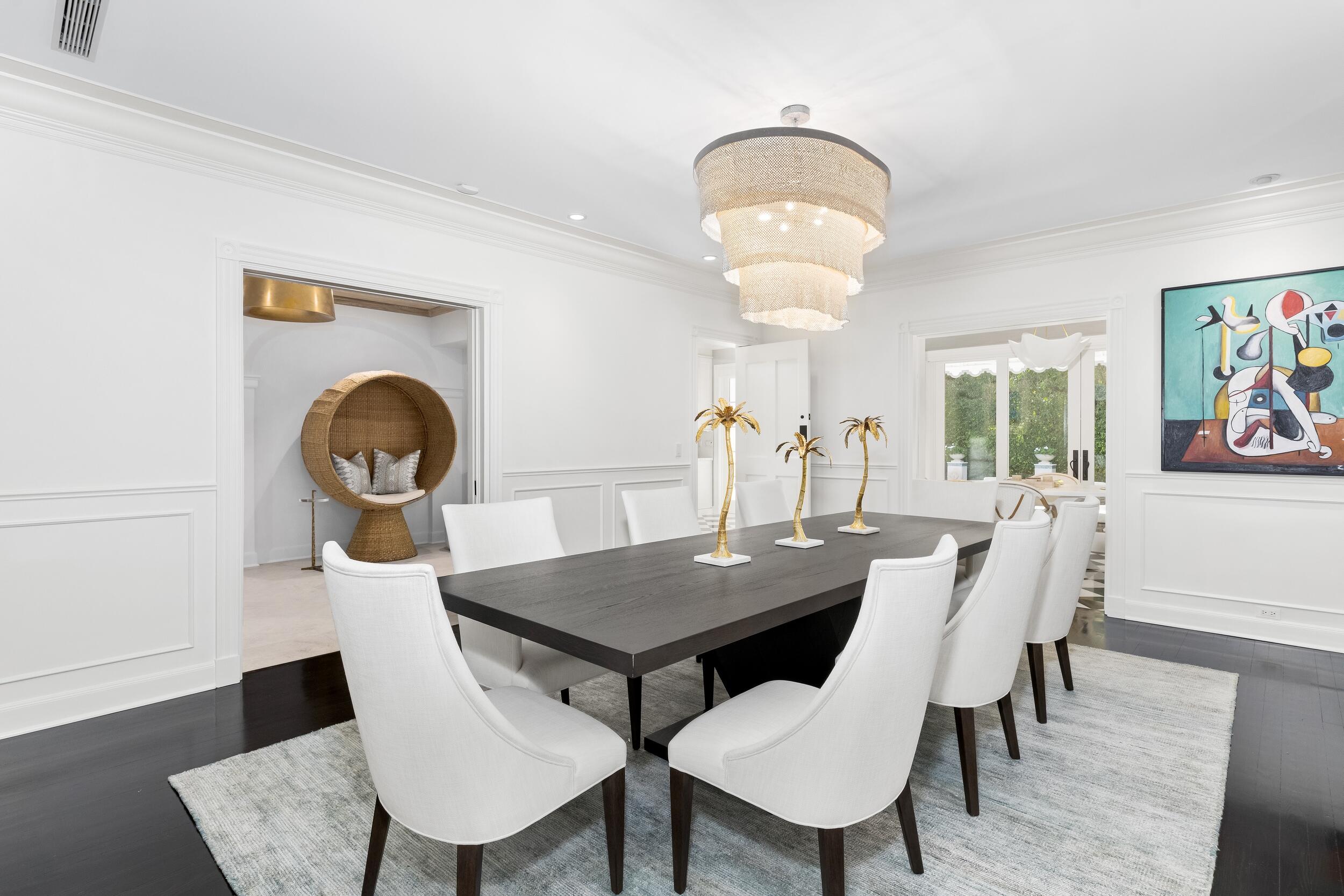 130 Cocoanut Row Palm Beach, FL 33480 - Photo 22 of 66 a view of a dining room with furniture and wooden floor