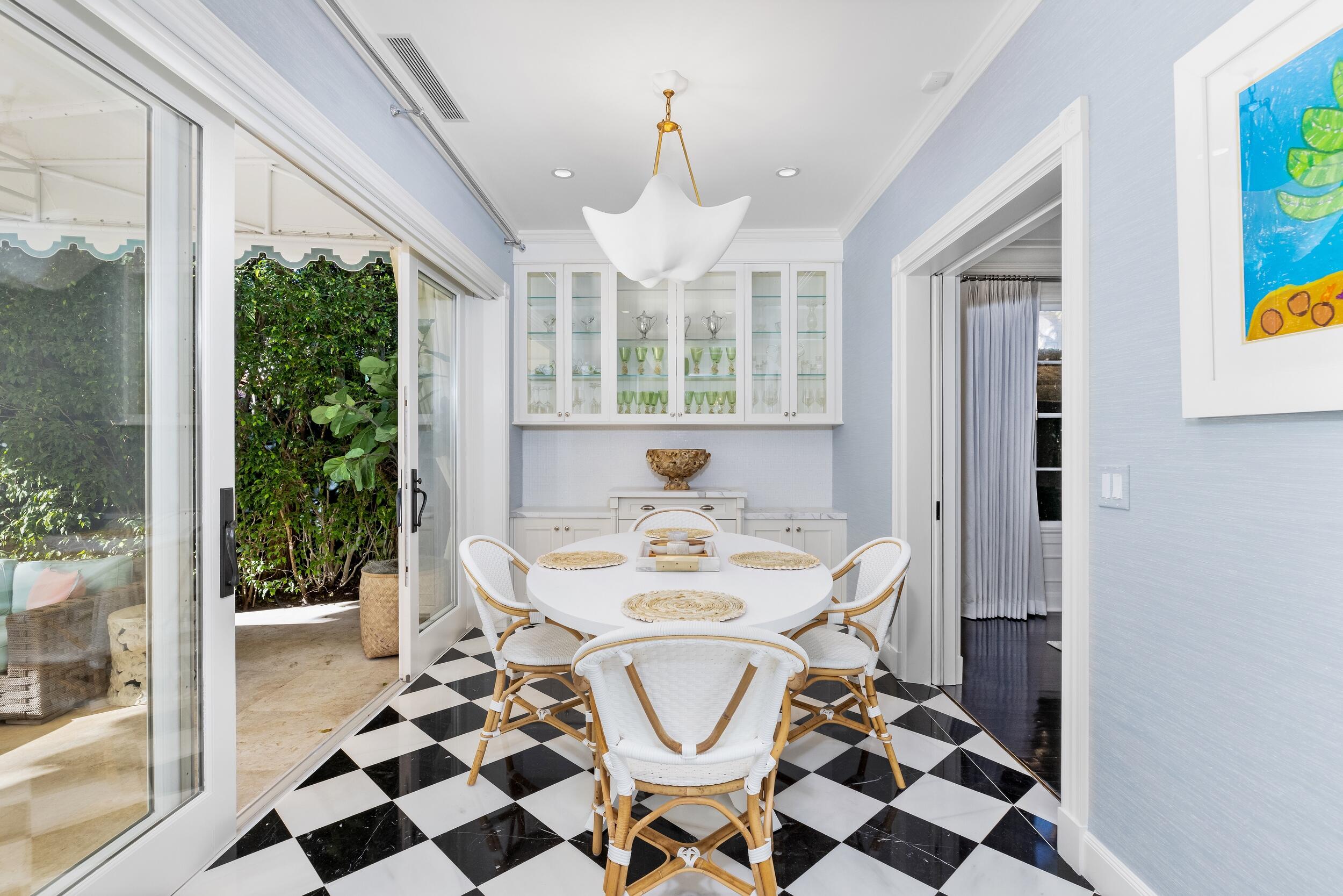 130 Cocoanut Row Palm Beach, FL 33480 - Photo 30 of 66 a view of a dining room with furniture window and outside view